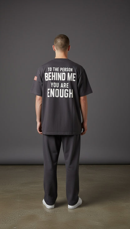 Forged By God charcoal grey crewneck t-shirt with white inspirational back print and small American flag sleeve detail.