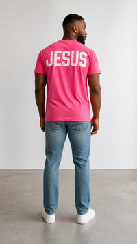 Forged By God pink crewneck t-shirt with distressed white JESUS graphic on back and American flag sleeve detail